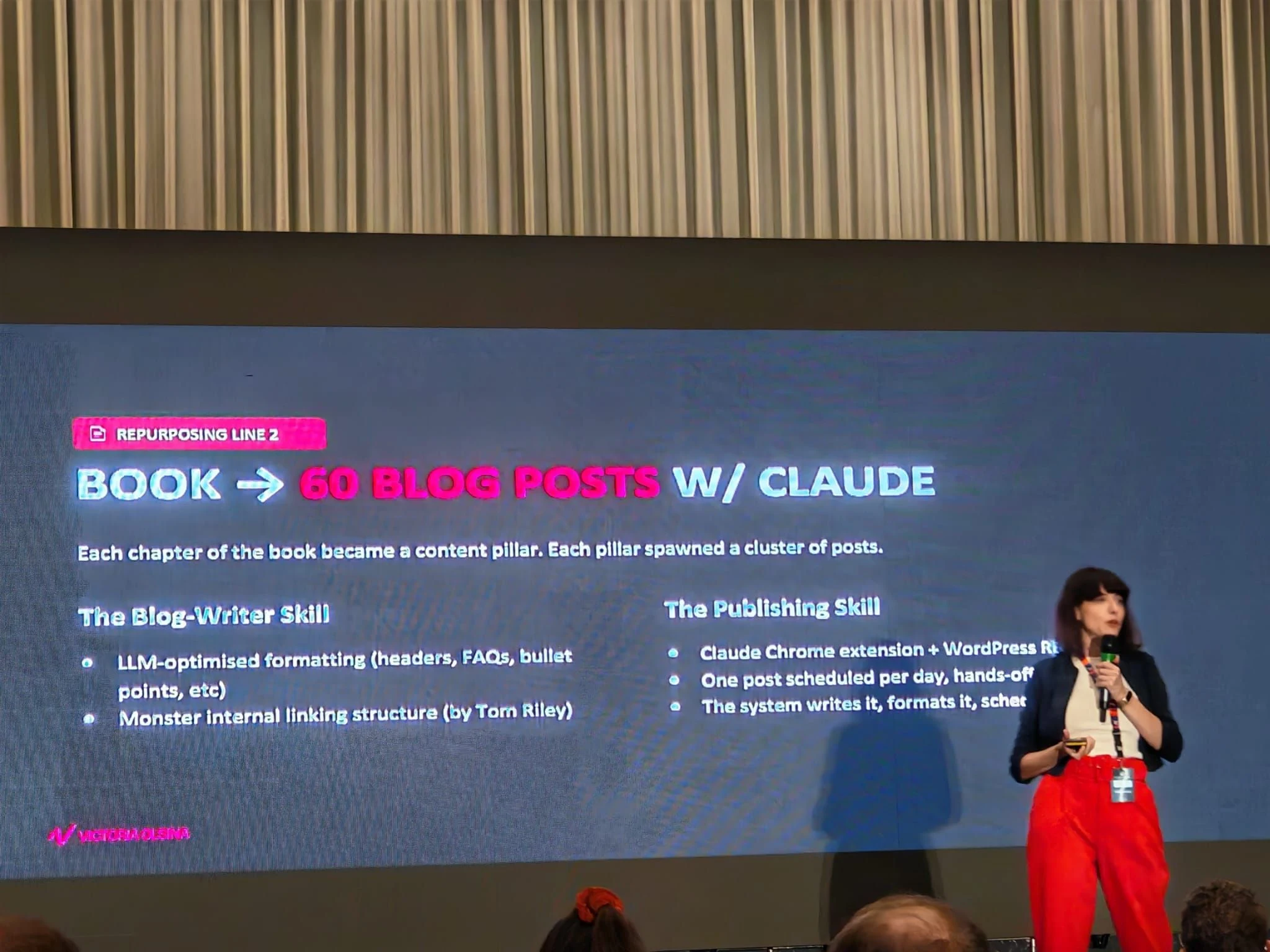 Victoria Olsina crediting Tom Riley on the main stage at SEO Masterminders